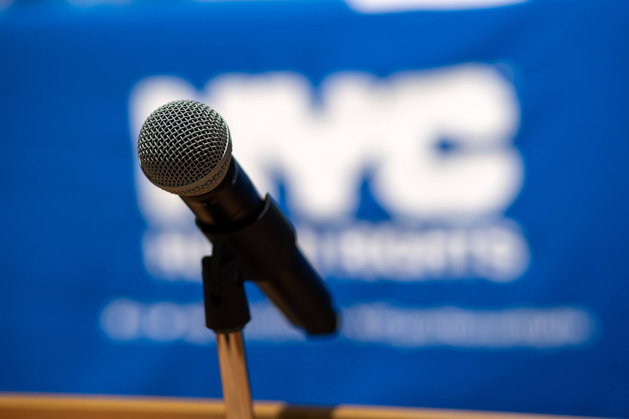 Close-up of microphone on table.