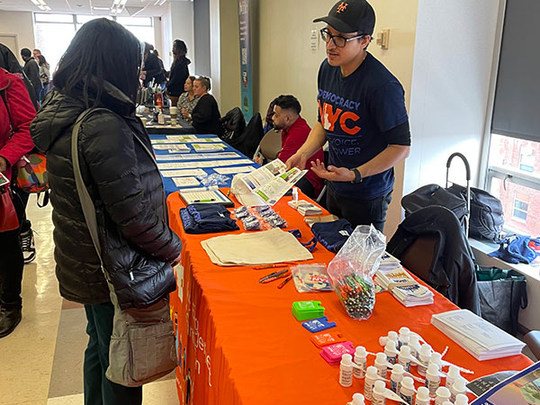 CEC outreach staff interacting with participant