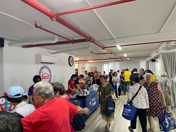 people move around in the community fair