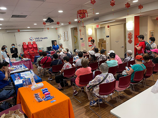 a group elderly sitting at the waiting room