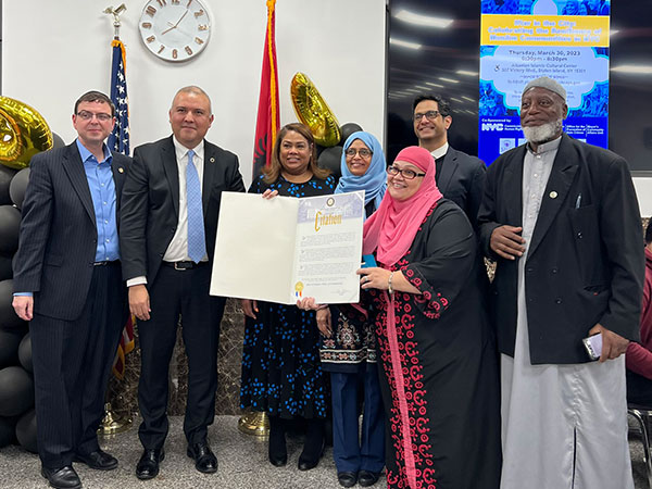 Group photo of CEC Chair and Executive Director Dr. Sarah Sayeed with city agency commissioners
