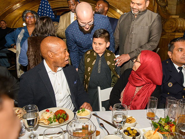 Mayor Eric Adams with Dr. Sarah Sayeed interacting with attendees