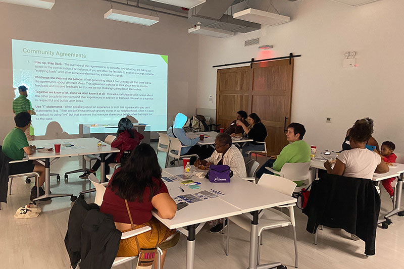 Participants learning about The People's Money process.