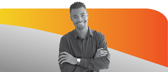 Young man with arms folded, smiling Young man with arms folded, smiling