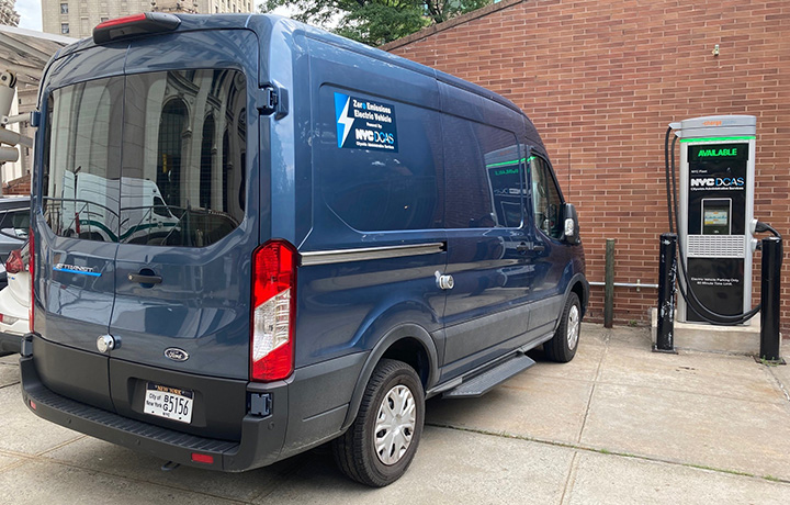 Large N Y C D C A S renewable tanker is parked in a parking lot.
                                           