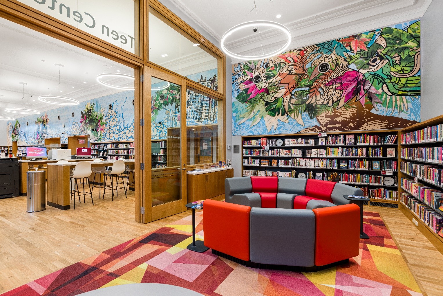 David Rios' mural of a face covered in tropical leaves and flowers.