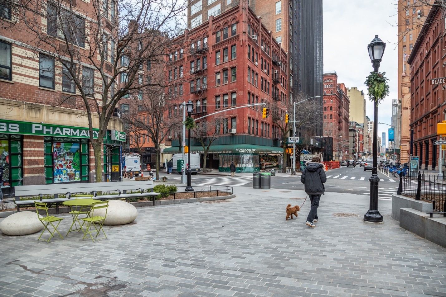 Pedestrian strolls in Bogardus Plaza