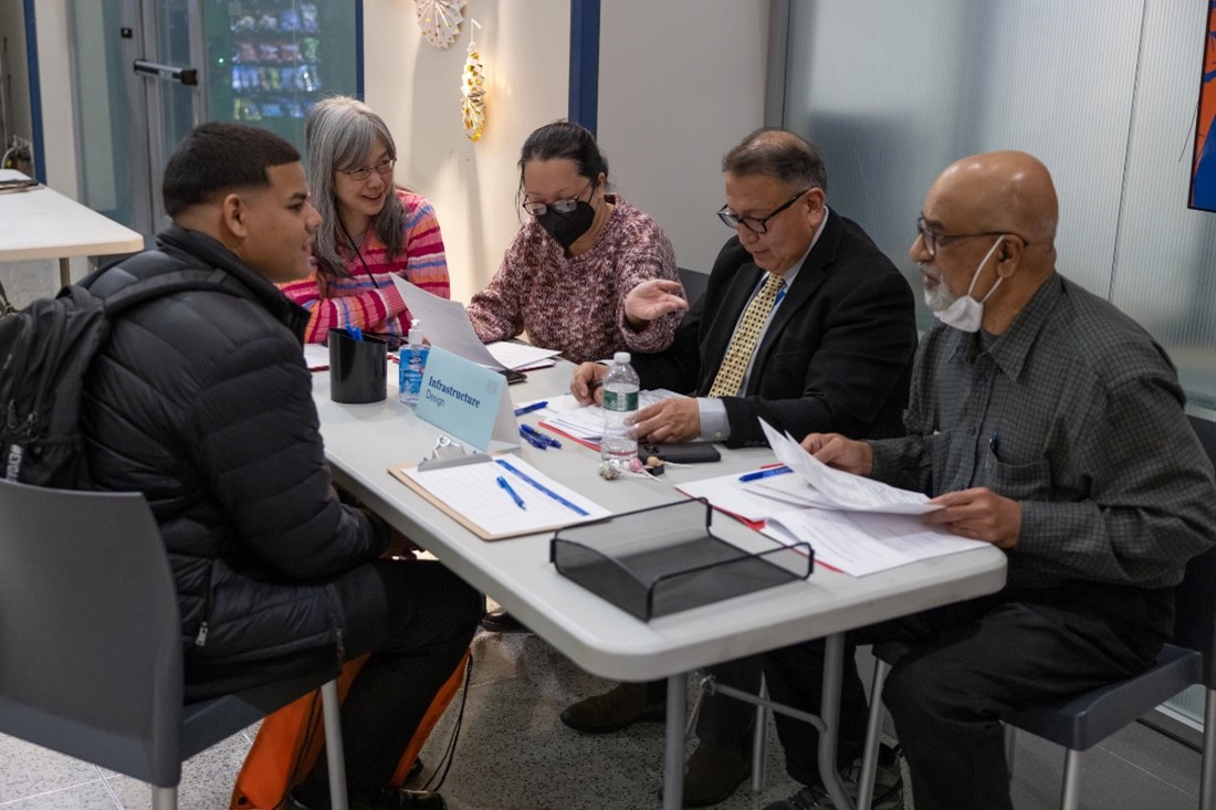 a job candidate meets with agency staff