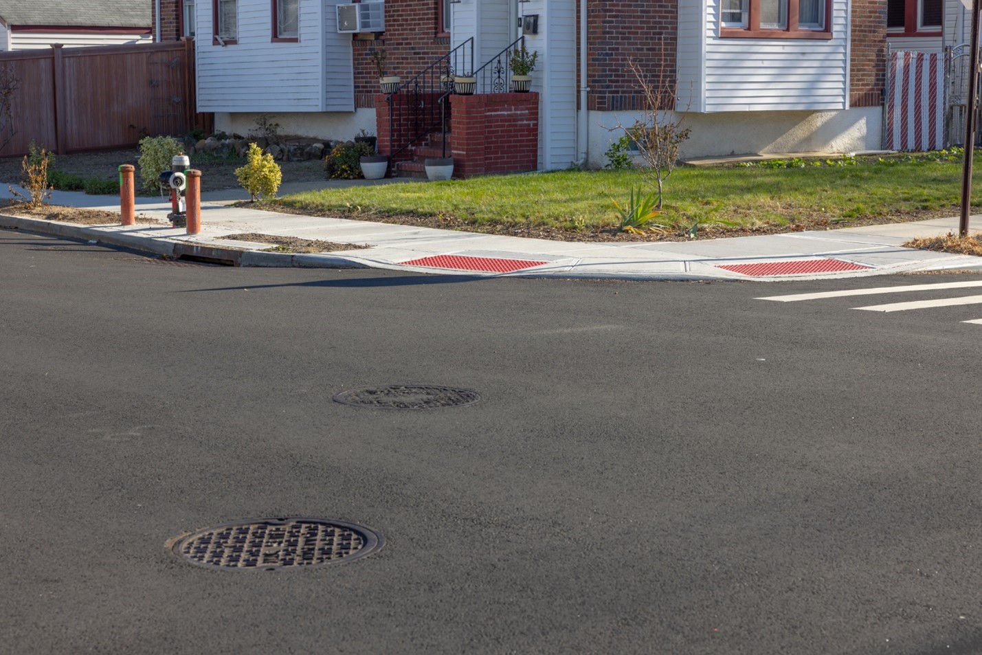 pedestrian ramps and paved roadway