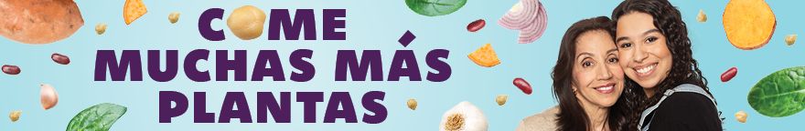 Photo of smiling couple with vegetables in the background. Text reads: Eat a lot more plants.