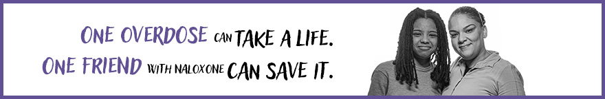An image of two people side-hugging. Text: 'One overdose can take a life. One friend can save it.'