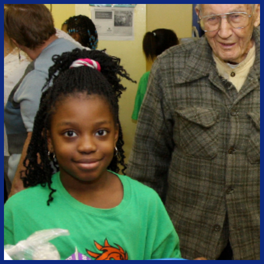 girl and male senior pose for picture