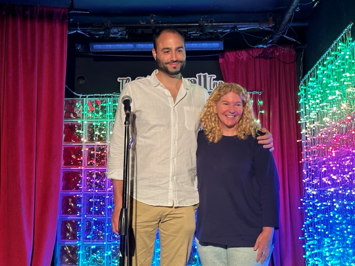 (From left to right) Acting Executive Director of the Unity Project Ronald Porcelli, and Co-Owner of the Stonewall Inn Stacy Lentz pose together for a photo on stage at this historic site.