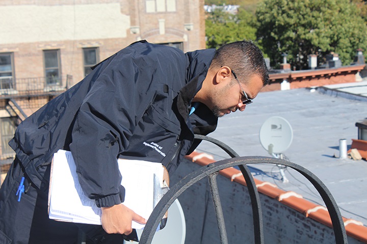 inspector looking at a building