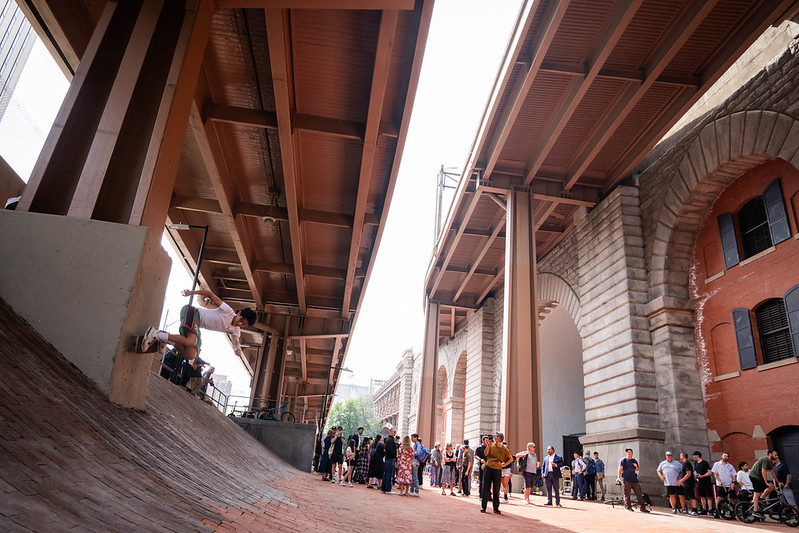 skateboarder by The Arches — Manhattan side of Brooklyn Bridge