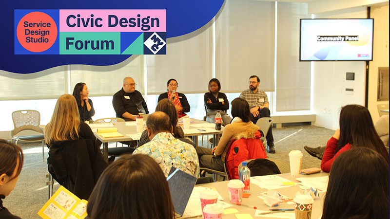 A community panel engaging in discussion at a Civic Design Forum event, with participants seated at tables taking notes. A Service Design Studio Civic Design Forum logo banner overlays the image.