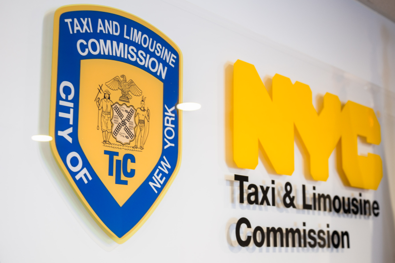Image of a sign at TLC depicting TLC's Shield and the Wording NYC Taxi & Limousine Commission Image of a sign at TLC depicting TLC's Shield and the Wording NYC Taxi & Limousine Commission