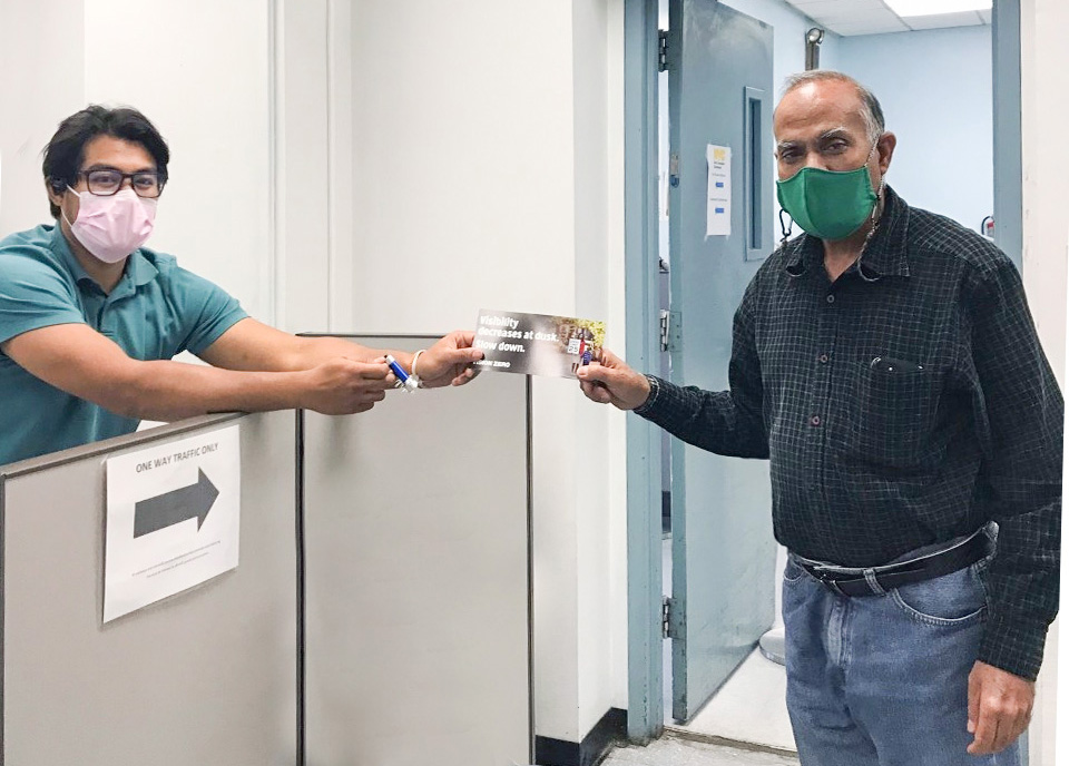 TLC Employee interacting with a member or the public