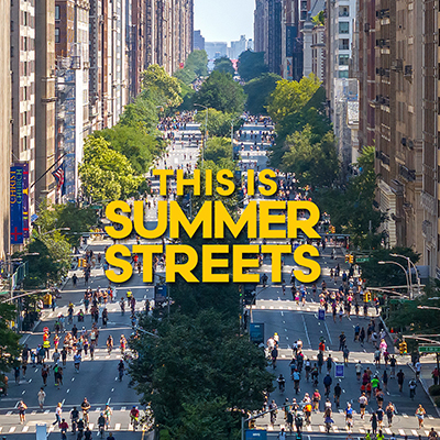 An aerial photo of Park Avenue during Summer Streets when the streets are empty of cars and full of people walking, biking, and running along the roadways on a summer Saturday, text overlay reads This is Summer Streets.