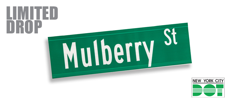 Red overlay text reads “Sold Out” over green and white sign of Mulberry Street.