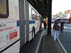 Bus Stops Under the El at 228th St in the Bronx - Before picture