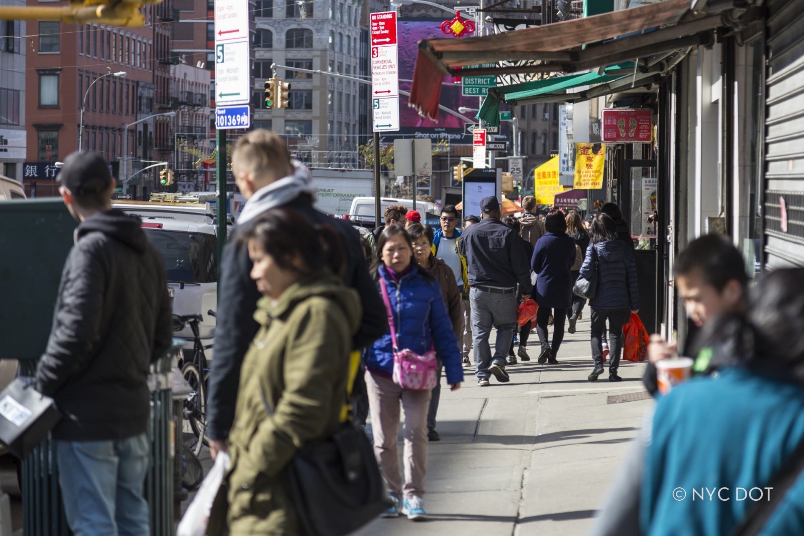 Pedestrians along Canal Street.