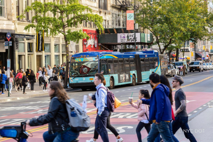 An M14D traveling along East 14th Street, at University Place.